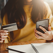 person using a credit card