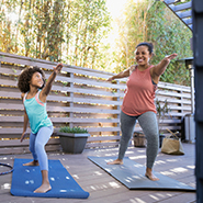 two women doing yoga