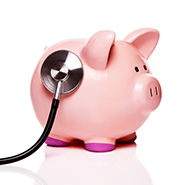 piggy bank with stethoscope