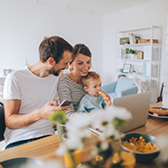 family browsing the internet using laptop