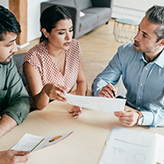 Couple meeting with a financial coach