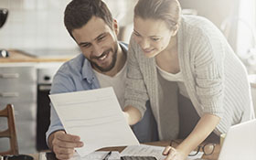 Couple working to defeat debt